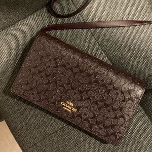 Coach fold-over crossbody clutch